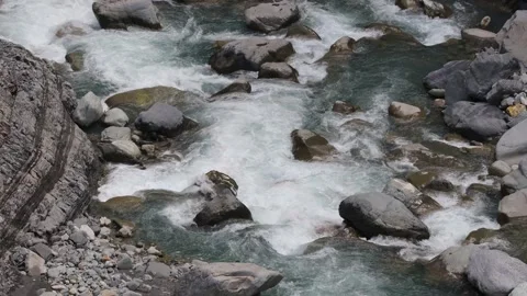 Strong stream in deep valley.gurgling pour water.Charming Valley. Stock Footage 278281533