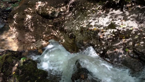 Strong stream of Vilsos river on the stony coast Stock Footage