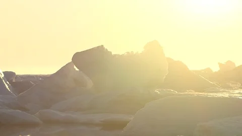 Strong sunlight on an iceberg at the North Pole Stock Footage 104953898