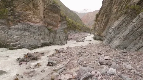 Strong water flow in the mountain, fast and hard water stream Stock Footage 104988760