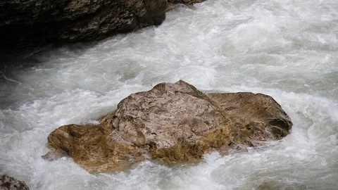 Strong water stream with white foam. Mountain river, slow motion 180 fps Stock Footage 168150340