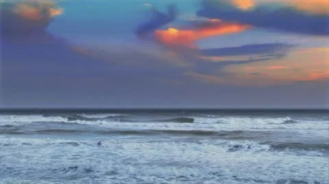 Strong wave washing up at sunset Stock Footage 10885630