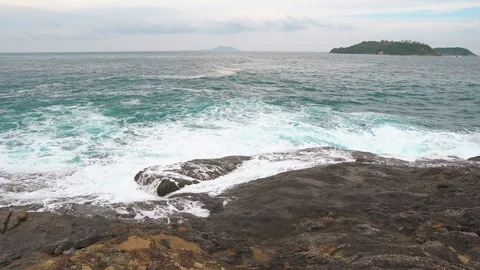 Strong waves on the beach. the power of the elements, the waves break on the Stock Footage 105621376