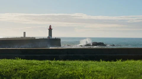 Strong waves crash and break in Porto shore in Portugal during wintertime Stock Footage 293614216