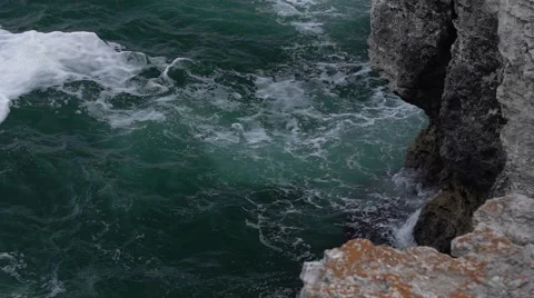 Strong Waves Crashing at Rocks Slow Motion HD Stock Footage 66564432
