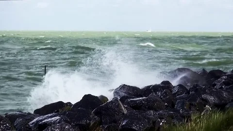 Strong waves on the dike Stock Footage 84967605