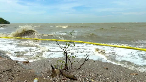 Strong waves hitting the beach during rough sea conditions. Stock Footage 322513839