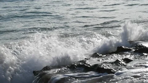 Strong waves of Ionical sea breaking and splashing against the shore Stock Footage 141127024