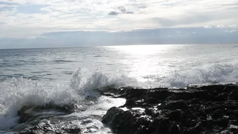 Strong waves of Ionical sea breaking and splashing against the shore Stock Footage 141127035