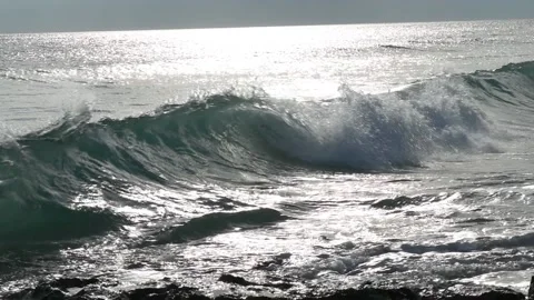 Strong waves of Ionical sea breaking and splashing against the shore Stock Footage 141127046