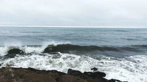 Strong waves on rocky beach Video stock 138145069