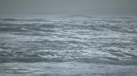 Strong waves on a windy day before sunrise (High Definition) Stock Footage