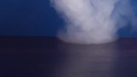 Strong white smoke on the black background Stock Footage 75794861