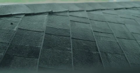 Strong wind and rain hit the roof of the house Stock Footage 249992098