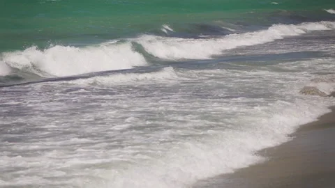 Strong wind blowing and waves on blue-green Mediterranean sea Stock Footage 131394499