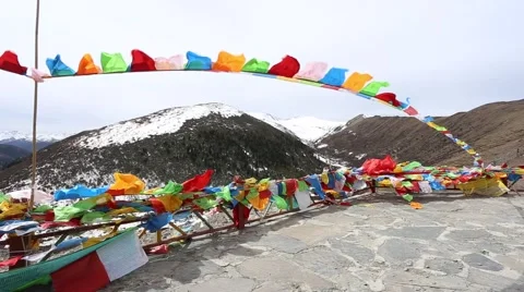 Strong wind blowing the colorful prayer flags Stock Footage 63484401