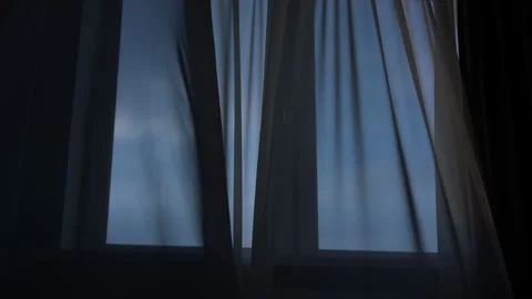 Strong wind blowing in open window and swaying thin curtain Stock Footage