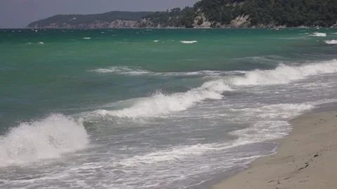 A strong wind blowing over blue-green Mediterranean sea and waves Stock Footage 132223911
