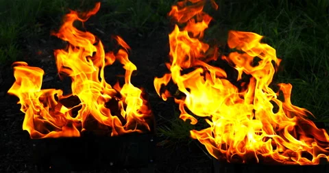 Strong wind blows the flame in the braziers Stock Footage 117030120