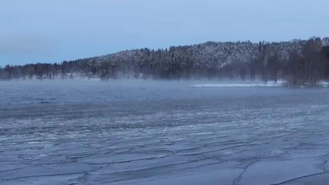 Strong wind breaks the ice on the lake Stock-Footage 245343824