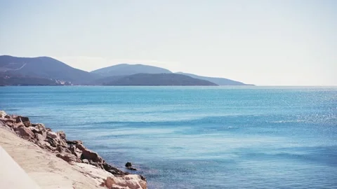 Strong wind creates ripples on the blue sea surface on a sunny day. Stock Footage 237596062