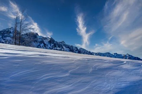 Strong wind creating waves on the snow, Stock Photos