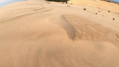 Strong wind in the desert, white sand dunes in Mui Ne, Vietnam. Stock Footage 103829697