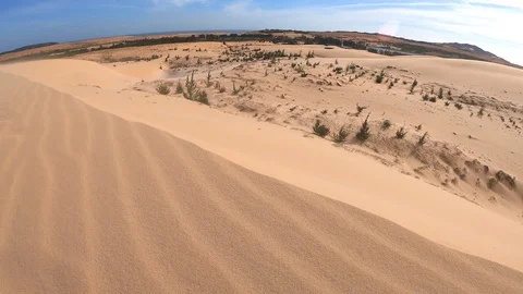 Strong wind in the desert, white sand dunes in Mui Ne, Vietnam. Stock Footage 103838154