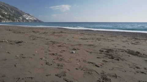 Strong wind on deserted winter beach in Positano Stock Footage 108122314