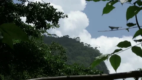 Strong Wind Drives White Clouds Over Green Mountains Honduras 4k Stock Footage 196835227