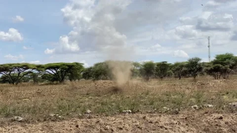 A strong wind forms a small tornado of sand Stock Footage 170183148