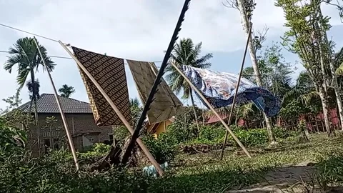 The strong wind made the clothesline sway to fly Stock Footage 221817244