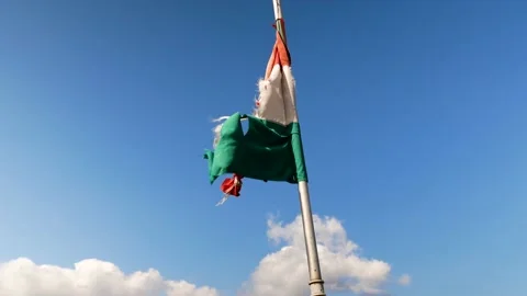 Strong wind moving the tattered , worned hungarian flag Stock Footage 139151950