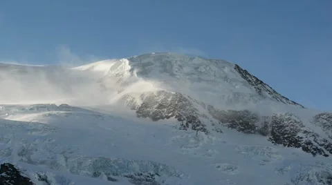 Strong wind over glacial mountain ridge Stock Footage 46220932