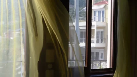 Strong wind ripples curtains. Stock Footage 137676068