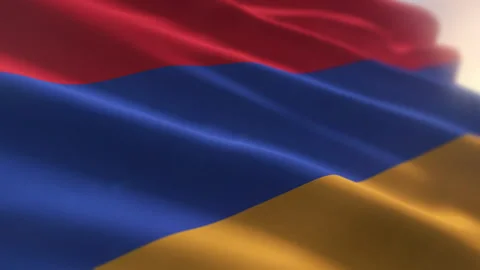 Strong wind shaking the national tricolor symbol of the Armenian people Stock Footage 288115973