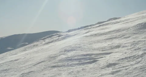 A strong wind whirls the snow Video stock 269854292