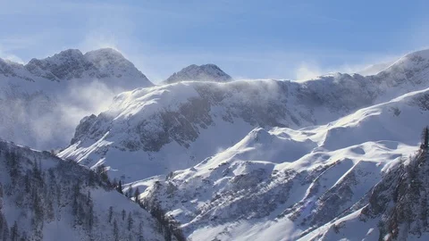 Strong winds are blowing in the winter mountains of Tirol Stock Footage 101898177