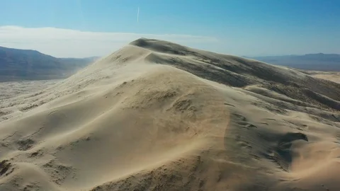 Strong Winds Blowing Sand Over the Kelso Sand Dunes Stock Footage 127007687