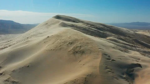 Strong Winds Blowing Sand Over the Kelso Sand Dunes Stock Footage 127008054