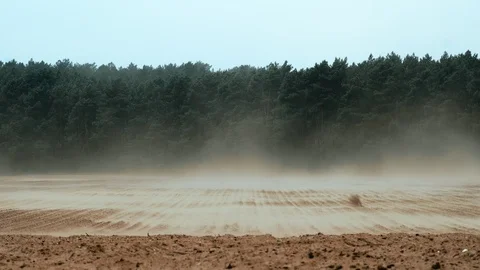 Strong winds sweeping nutricious soil off farmland in Germany Stock Footage 107427126