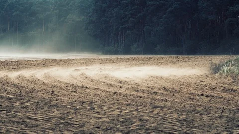 Strong winds sweeping nutricious soil off farmland Stock Footage 107608976