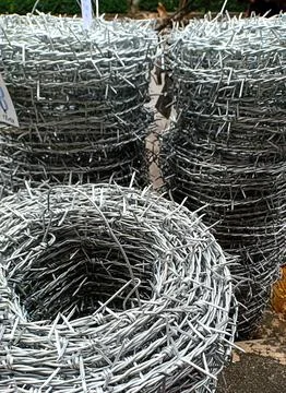 Strong wire with sharp points on it , used to prevent people or animals fro.. Stock Photos