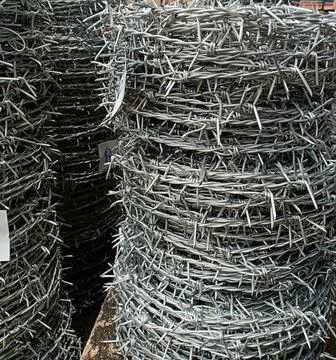 Strong wire with sharp points on it , used to prevent people or animals fro.. Stock Photos