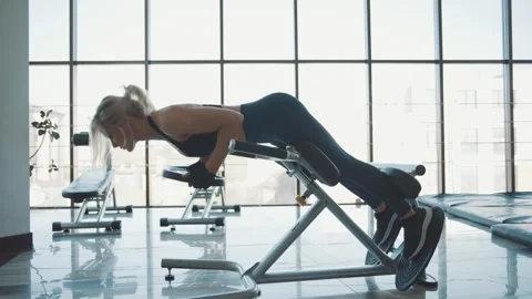 Strong workout session focusing on core strength and back engagement led Stock Footage 313326800