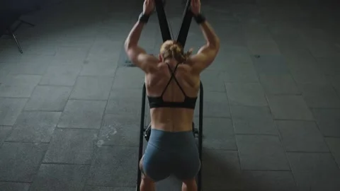 Strong workout session in slow motion at the gym showcasing Video stock 321424580