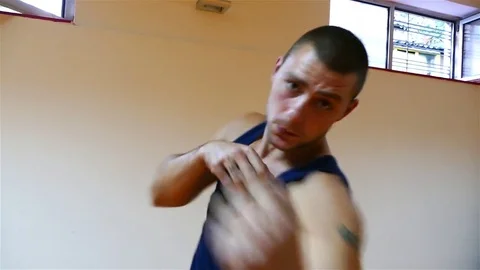 Strong young boxer doing exercises in the gym. Stock Footage 83994126