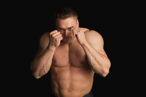 Strong Young Man Boxer Looking at Camera Foto stock