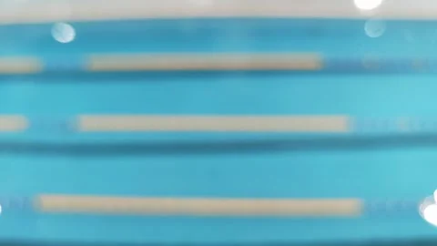 Strongly blurred defocused blue background of water in the pool. Stock Footage 248357072