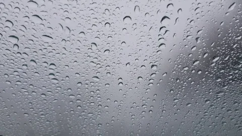 Strongly misted glass with raindrops Stock Footage 83677242